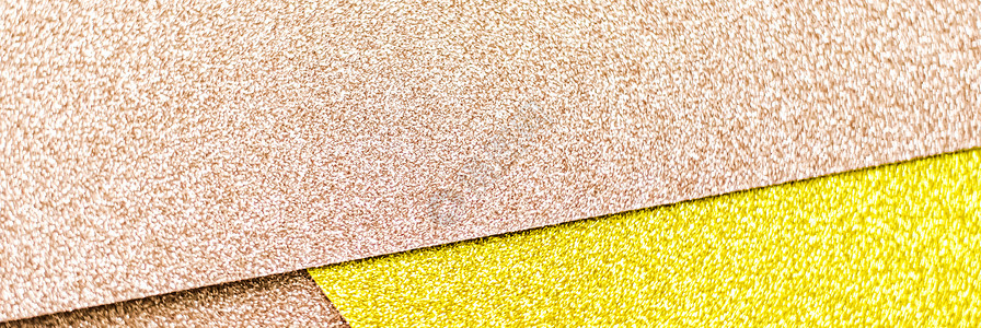 粉红和黄色闪光闪亮的纸面背景 抽象和假日背景粉色推广帆布玫瑰织物桌面品牌墙纸建造假期背景图片
