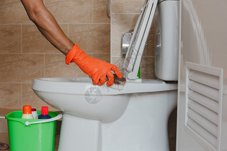 浴手套洗厕所清洁度橙子卫生工作浴室座位家务家庭工具橡皮背景