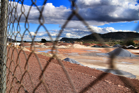 西班牙多姿多彩的建筑综合山峰制作人集体挖掘产物矿物生产矿业制粒材料制造商背景图片