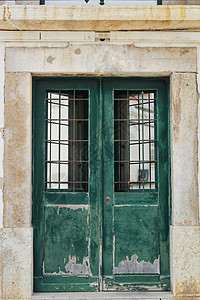 里斯本古老的五颜六色的门黑色古董晴天木头建筑入口日光蓝色农村生活背景图片