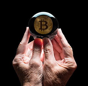 比特币与地球人手握着水晶玻璃预测球 预测比特币的未来价格背景