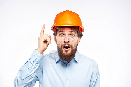 情感工人橙色涂漆工程专业建筑工 作物种植的观景建筑师衬衫建筑工作室工程师白色帽子领班安全男人背景图片