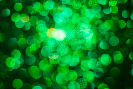 绿灯抽象bokeh背景 克莉丝玛光彩灯散景圣诞庆典假期色彩绿色火花背景图片
