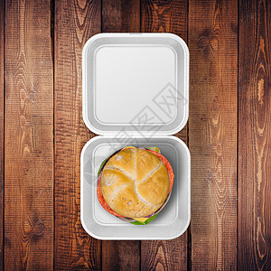 白色食品集装箱贴着汉堡夹在木头桌上的白食品标签高清图片