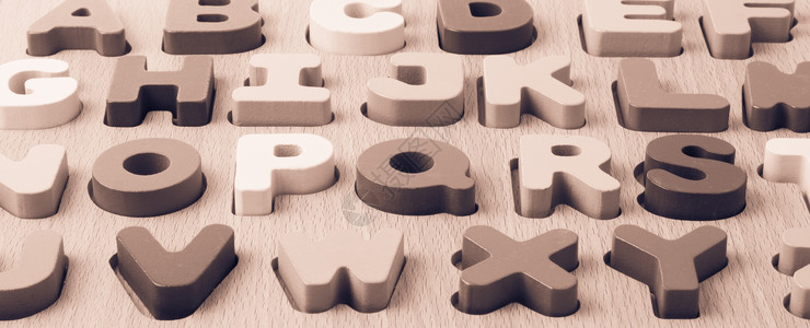 美国广播公司惠特船上的彩色字母块学习拼写玩具文学学校游戏字体阅读积木字母背景