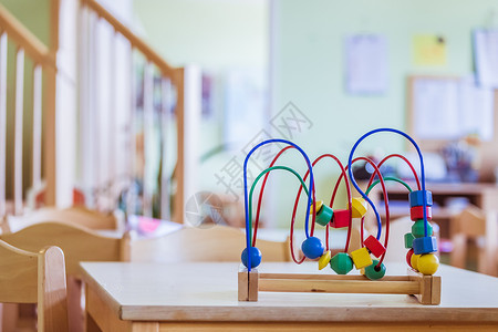 童年与社会化概念 幼儿园的多彩木偶玩具一体化知觉家庭职业包容性技巧语言自闭症时代学前班背景图片