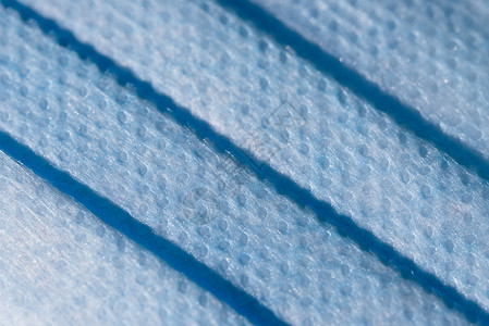 防护层透明膜明亮的蓝色面罩特写提供抽象的酒窝纹理背景
