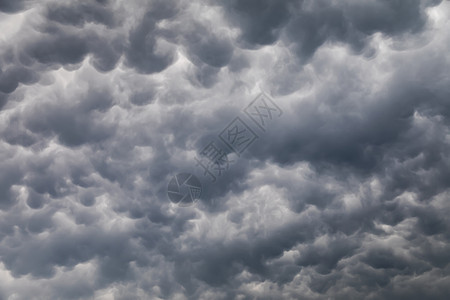 风暴前线Mammatus 云层背景天气蓝色气象风暴雷雨戏剧性天空前线空气乳状背景