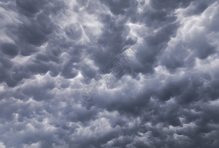 风暴前线Mammatus 云层背景天气戏剧性天空风暴蓝色灰色前线雷雨类型空气背景