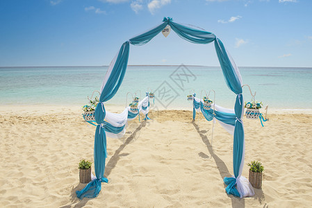 婚礼蓝色热带海滩的婚礼过道安排结婚日海景假期海洋天堂荒岛花朵海岸地平线海岸线背景