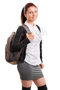 女孩背背包年轻女学生用背背包微笑背景