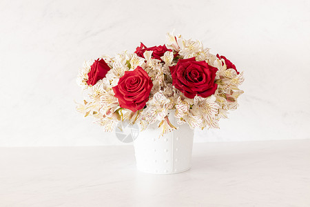 抽象花束由春季红玫瑰组成的花香安排花朵礼物园艺展示珊瑚周年花瓣花束纪念日花店背景