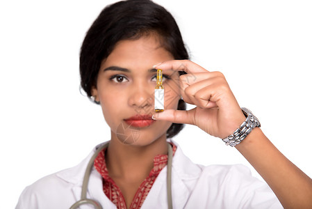 女医生 展示白色背景的医药管子妇女医生工具测试临床疾病外套材料医院职场帽子女士背景图片