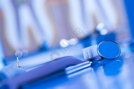 保健 病理学设备 牙科概念工具医疗诊所牙齿矫正金属医生镜子治疗牙医背景图片