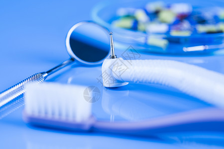 保健 病理学设备 牙科概念镜子药品牙医金属卫生牙齿乐器口腔科工具医生背景图片