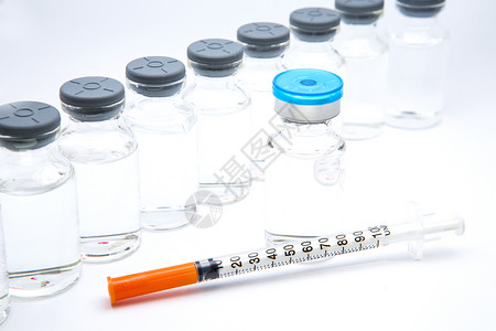 白种背景的一瓶疫苗玻璃白色制药标签注射器安瓿药品小瓶科学诊所背景图片