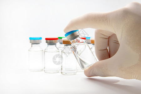 白种一瓶疫苗剂量白种背景的一瓶疫苗实验室流感种类注射器药剂药店治疗治愈医院小瓶背景