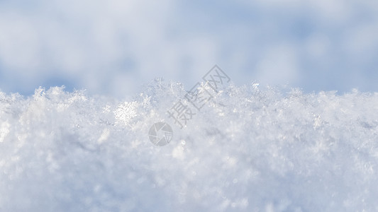 新雪的背景 自然的冬天背景 蓝色吨的雪纹理漂移天气假期水晶雪堆宏观雪花薄片材料冻结背景图片