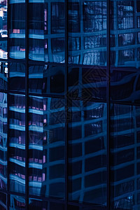 现代摩天大楼的玻璃窗金融街道商业网格天空城市建筑玻璃镜子反射背景图片