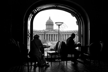 读书卡图片男女在俄罗斯圣彼得堡书店一家咖啡馆阅读书籍的 男女宪章背景