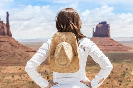 巨谷的女童女性牛仔橙子峡谷衬衫帽子旅游沙漠手套自由高清图片