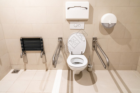 厕所安全栏配备特殊设备的残疾人公共洗手间的公共卫生间淋浴医院浴室护理安全残障扶手减值情况壁橱背景