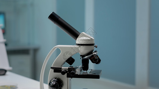ps中花素材专业研究实验室中的科学显微镜PS研究员液体工具制药化学品考试实验科学家生物学乐器背景