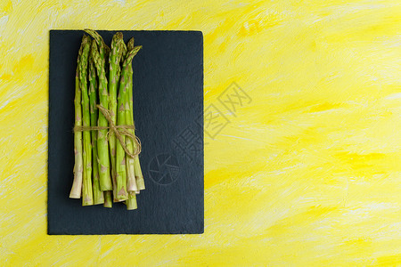 芦笋田新鲜绿色的Asparagus 烹饪健康饮食 一群绿树paragus 复制空间背景