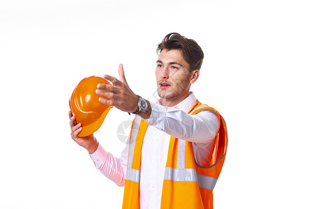 橙色统一制服职业轻背景的员工精神力工作者工程技术建筑学植物工程师成人经理商务安全帽领班背景