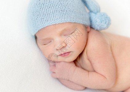 故宫上新了蓝帽子上新生婴儿的肖像背景