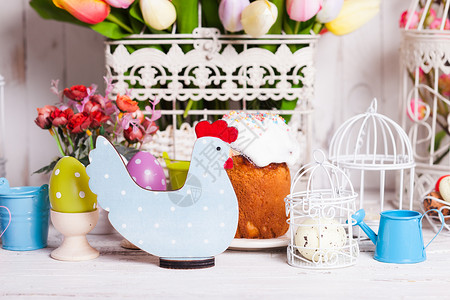 鸟笼里鸟复活节鸡鸡庆典蓝色郁金香蛋糕传统圆点季节花朵风格鸟笼背景