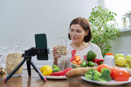 科学养育视频边框使用智能手机 有关健康饮食的博客专家引导流治疗坚果营养卫生水果蔬菜办公室视频重量博主背景