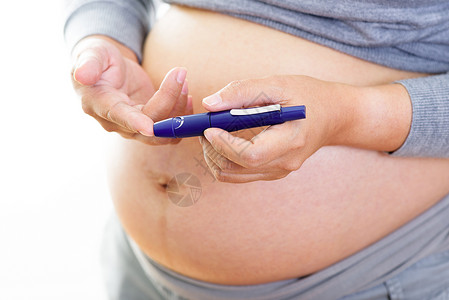 柳叶刀患有糖尿病的孕妇控制女士医生测试母亲手指肚子工具葡萄糖治疗背景