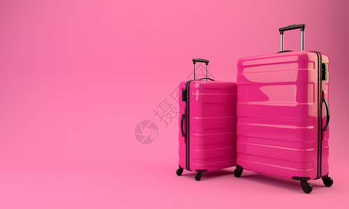 粉红色背景上的两个红色手提箱高清图片