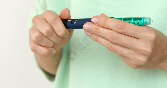 胰岛素注射笔糖尿病变成胰岛素笔 注射正确剂量背景