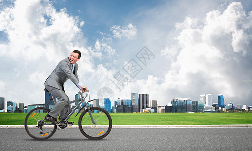 乘自行车前往上班的商务人士背景图片
