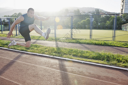青年运动员跑步运动冠军竞赛训练速度火车竞技起跑线优胜者空闲背景图片