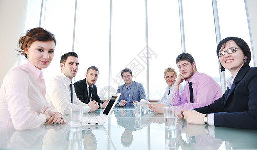 商业界人士小组在会议上的发言金融男人团队团体女性办公室推介会男性套装工作背景图片