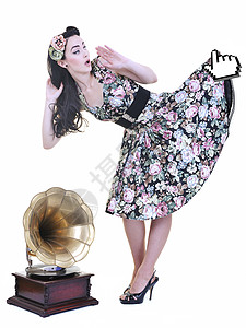 穿裙子老鼠鼠标光标手持年轻女性的裙子别针闲暇夜店控制音乐俱乐部宝贝舞蹈记录打碟机背景