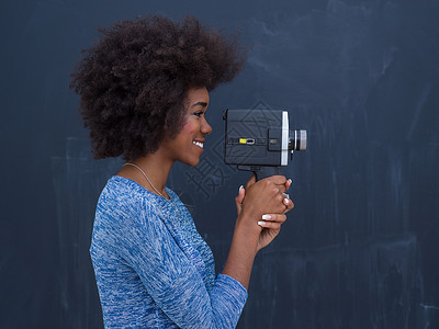 电视爆炸素材女士使用反向摄像头摄像师电影记录视频摄影师摄像机面试记者技术电视背景