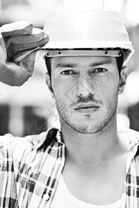 建筑工地的硬体工人工业建设者帽子商业承包商建筑师成人头盔修理工手势图片