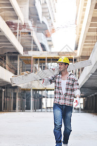 建筑工地的硬体工人建筑师劳动承包商工业工作帽子成人商业男人黄色图片
