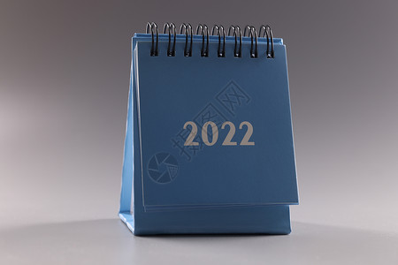 灰色背景的蓝绿叶历2022年背景图片