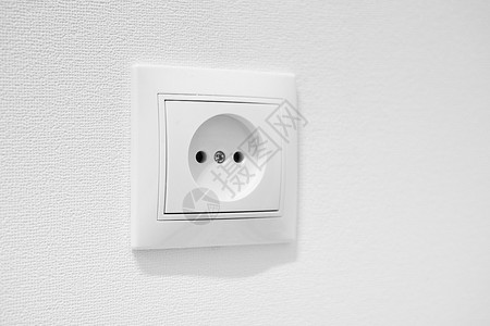 德国圆形凹槽插座 带两个圆孔 用于 2 针欧式插头 C E 和 F 常见的廉价塑料交流电源壁装插座 未接地欧式白色电插座 CEE背景图片