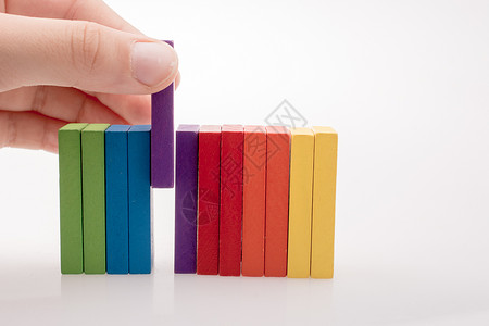 手持多米诺色活动逻辑积木玩具长方形学习商业教育创造力孩子们图片