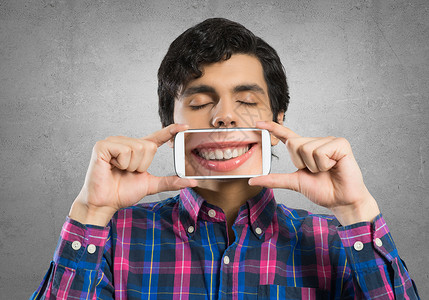 无语眩晕表情拥有移动电话的人牙齿白色电话社会男性技术屏幕网络符号细胞背景