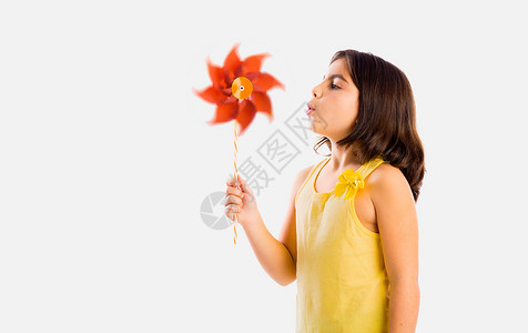 女孩吹风车青年女性玩具乐趣童年快乐活力生态喜悦教育图片