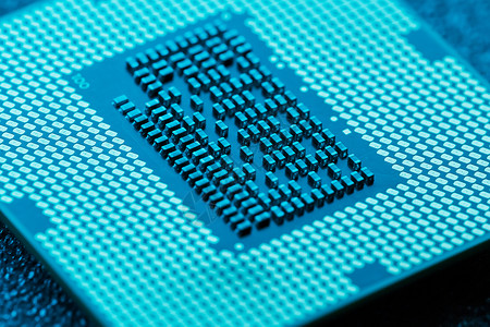 英特尔特写 CPU 芯片处理器 选择性焦点电路硬件母板卡片半导体插座技术单元别针木板背景