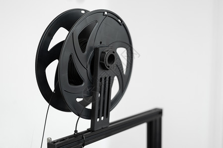 实验室3D打印机上的黑丝背景图片