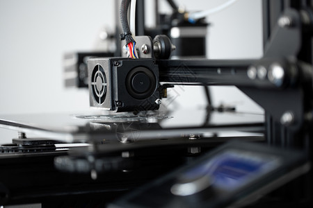 三宫格腹肌实验室的3D印刷机操作 由3D打印机负责电脑腹肌商业印刷打印聚合物灯丝软件工程生产背景